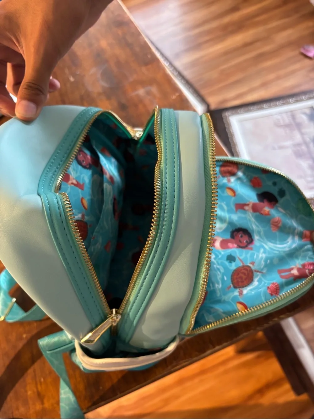 Loungefly Teal Moana Mini Backpack with Pink Character Accent